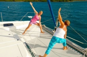 3.1A_ScrubIsland_Slide_8_Morning_Yoga_On_Catamaran_700x465