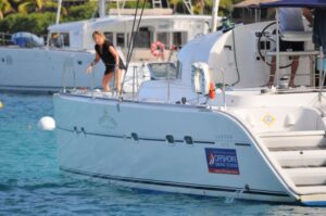 Learning to pick up a mooring in a crowded harbor