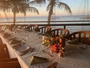 group dinner setting at sunset