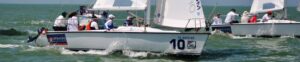 Students on a boat in green waters
