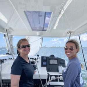 Two women on a sailboat