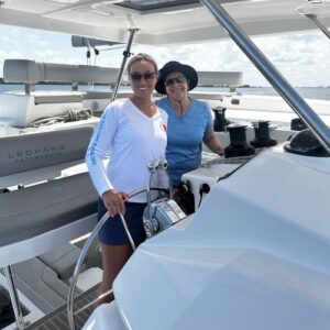Two women on a sailboat