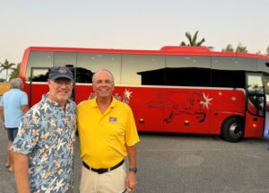 Nate and the author with tour bus in background