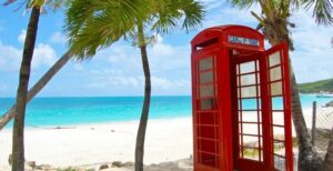 Red telephone booth on Antigua beach