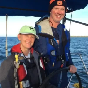 peopke smiling and sailing